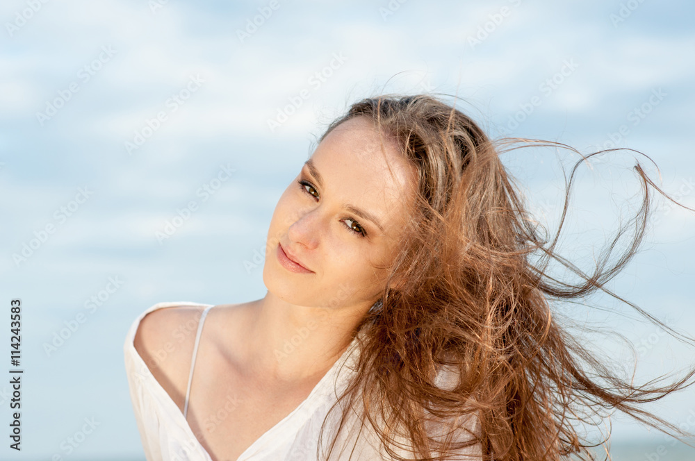Beautiful romantic girl on the beach