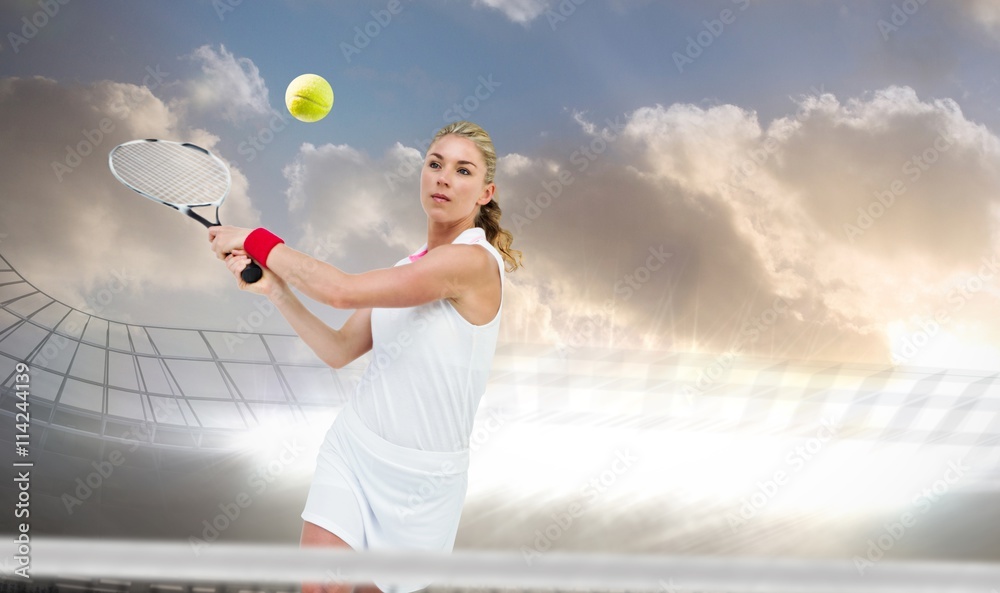 Fototapeta premium Composite image of athlete playing tennis with a racket 