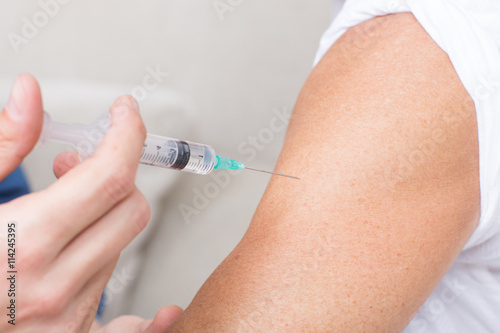 Photo Vaccinating a patient