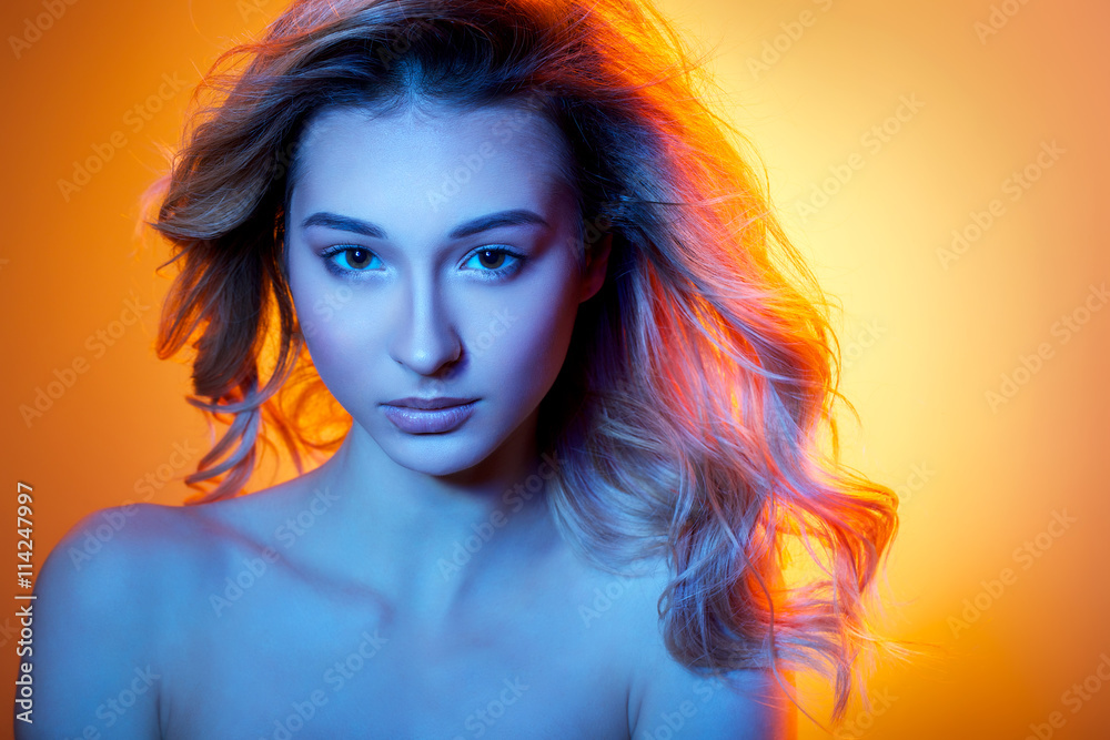 beautiful girl in colored light