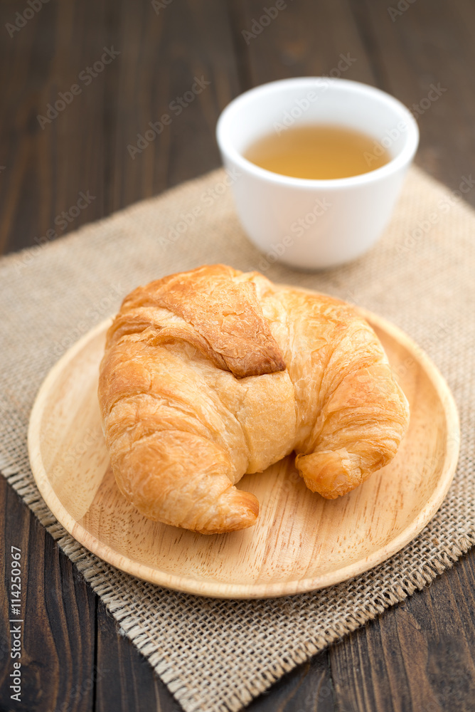 Fresh baked croissants with tea Fresh baked croissants with tea