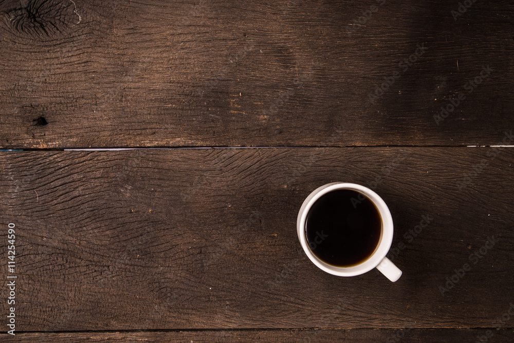 Top view hot black coffee on wood table desk background Top view hot black coffee on wood table desk background