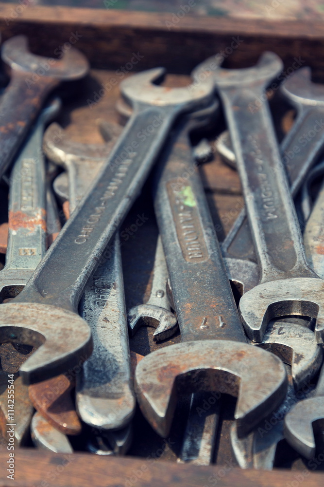 Loads of wrenches or spanners in a wooden drawer Loads of wrenches or spanners in a wooden drawer