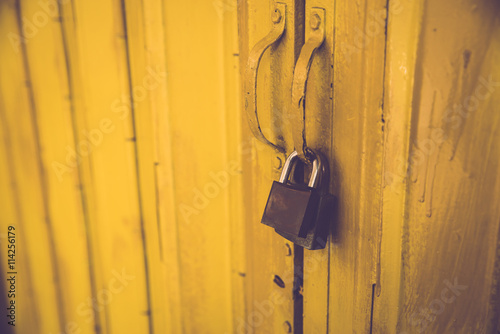 old lock on metal door photo