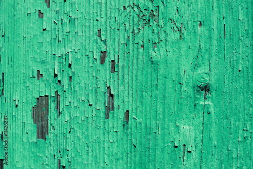 Фон стены с зеленой облупившейся краской