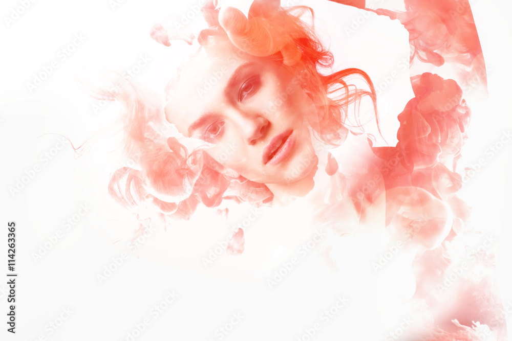 Fototapeta premium Double exposure portrait of young woman and cloud of red ink.