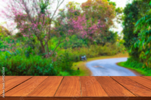 Wood table top on cherry blossom in Thailand. For display and montage products.