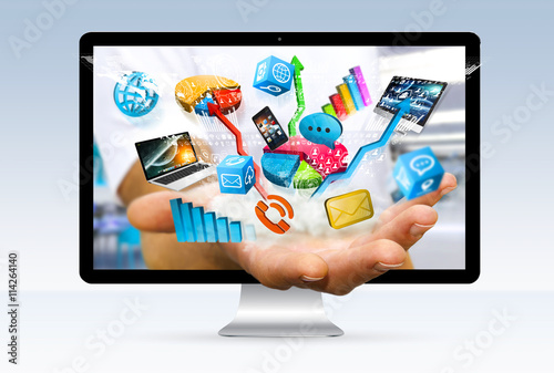 Colorful tech devices and icons applications in businessman hand