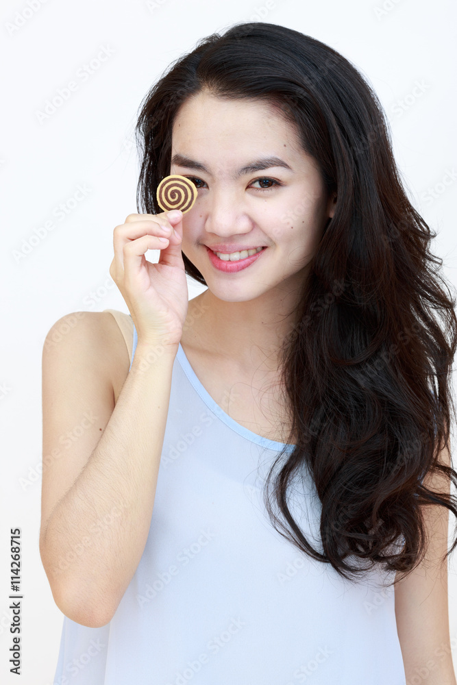Young pretty lady with cookie isolated on white Young pretty lady with cookie isolated on white