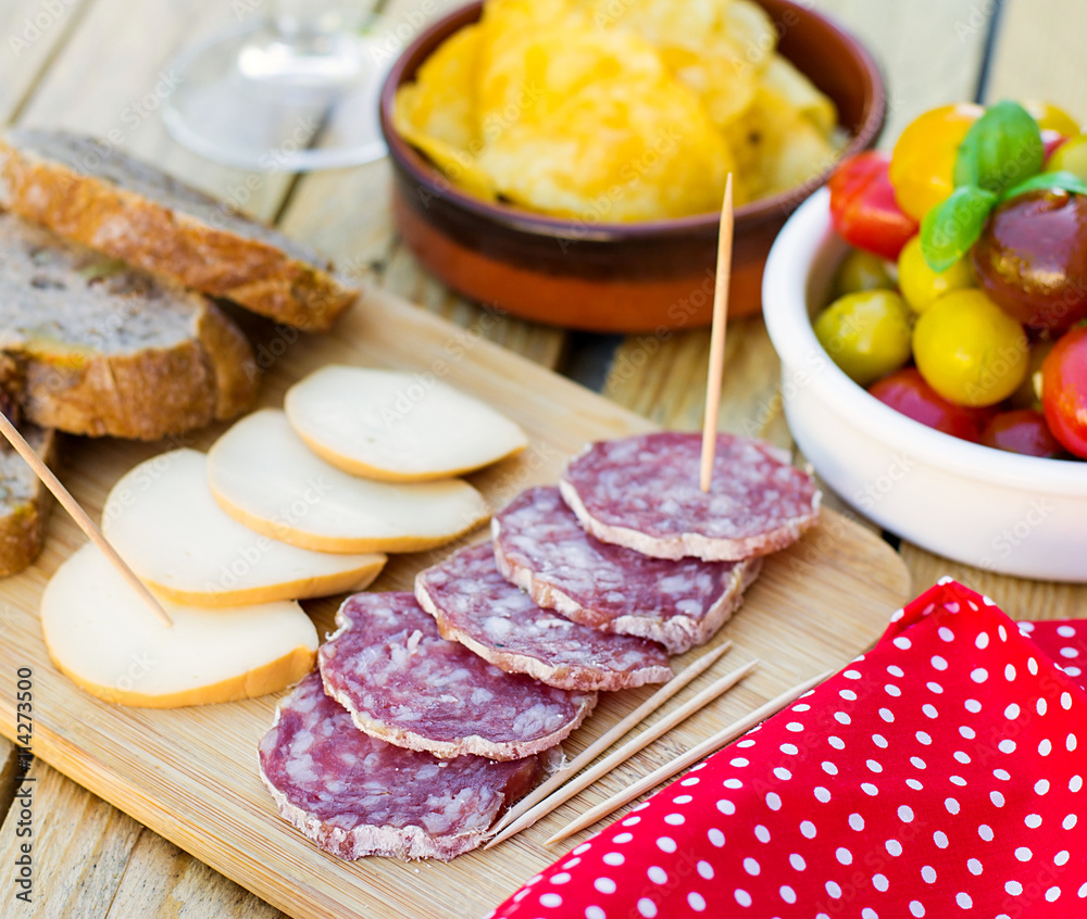 Salami et smoked cheese for tapas Salami et smoked cheese for tapas