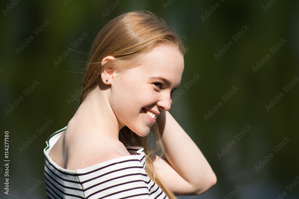 Closeup of a pretty girl smiling