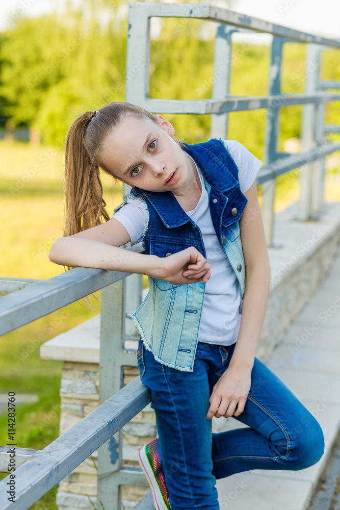 portrait of a beautiful girl outdoors in sammer