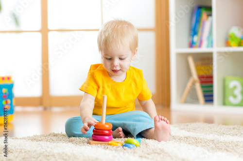 Preschooler child playing w...