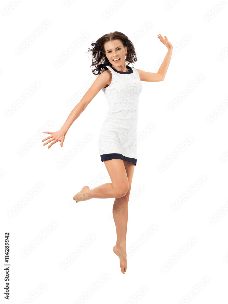 Happy attractive woman jumping in studio. Happy attractive woman jumping in studio.