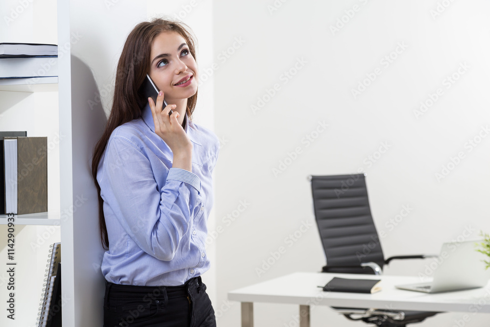 Woman talking on phone Woman talking on phone