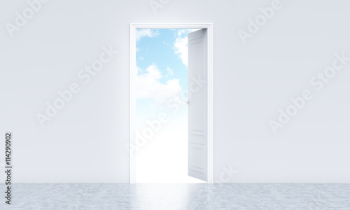 Open door revealing sky view