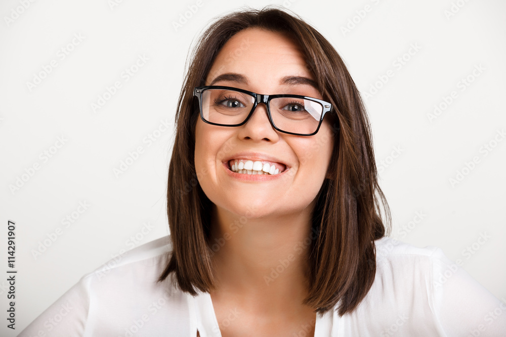 Portrait of girl playing ape over white background. Portrait of girl playing ape over white background.