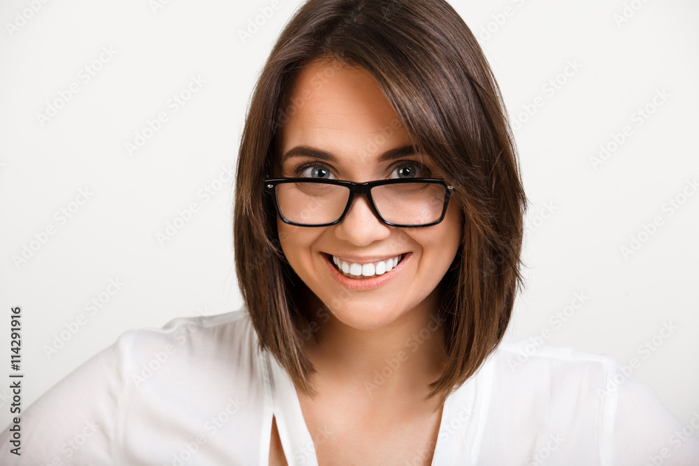 Portrait of girl playing ape over white background. Portrait of girl playing ape over white background.