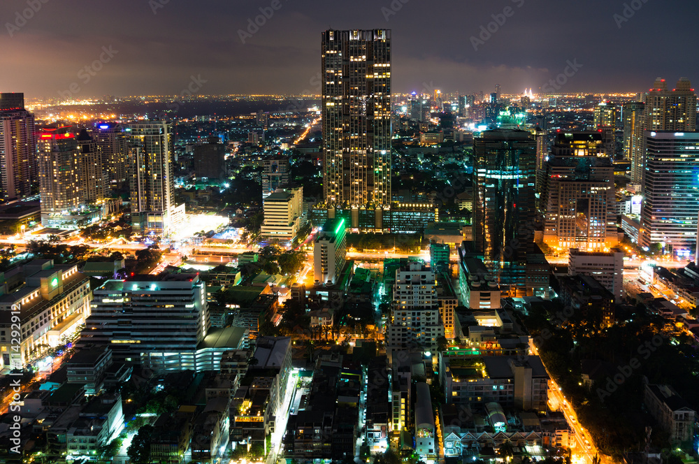 Aerial view of Bangkok city at night. View from above on modern Asian megalopolis cityscape at night