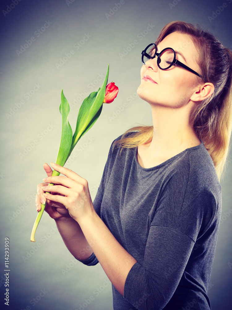 Charming woman smelling flower feel peace. Charming woman smelling flower feel peace.