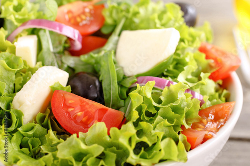 Colorful fresh vegetable salad with mozzarella