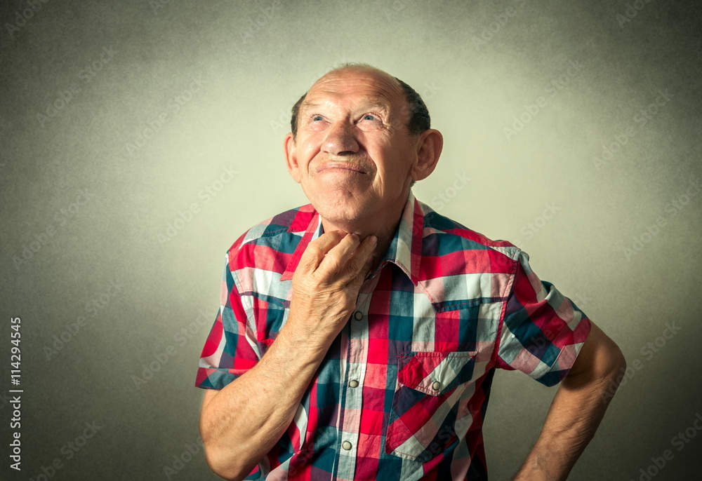 portrait of the funny senior man thinking portrait of the funny senior man thinking