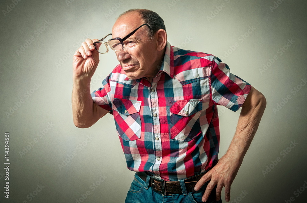 portrait of the funny senior man thinking portrait of the funny senior man thinking