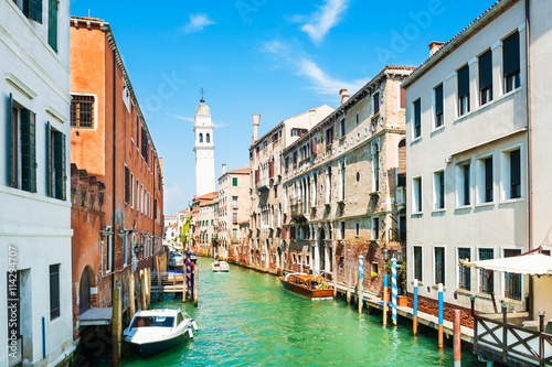 Scenic canal with ancient buildings in Venice  Italy