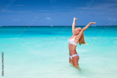 Happy woman on the beach