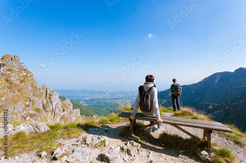 Young couple on top of a mountain