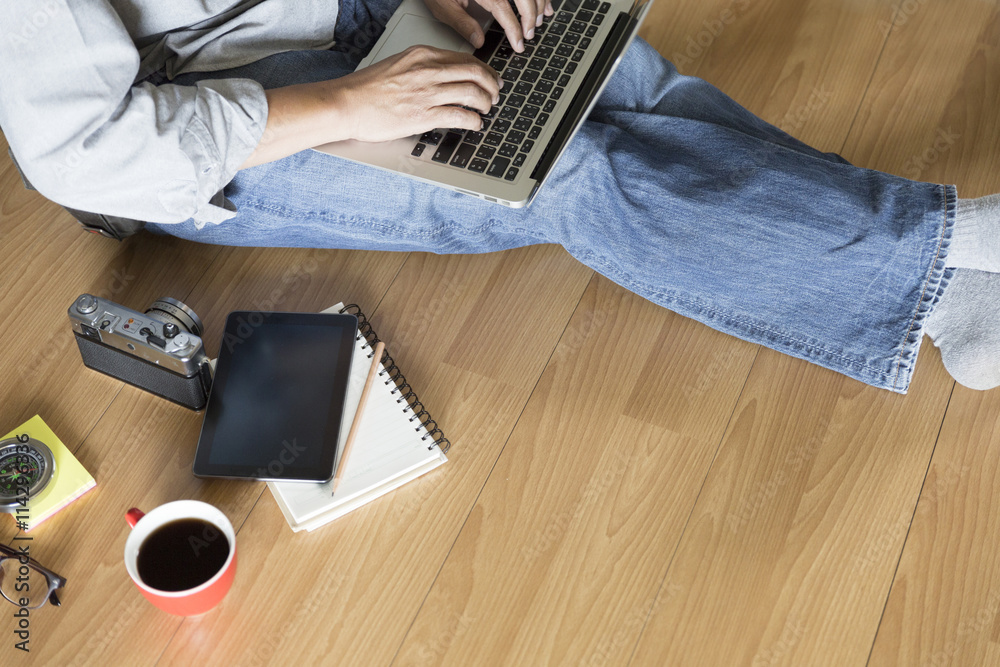 Fototapeta premium man with laptop computer, coffee cup and tablet