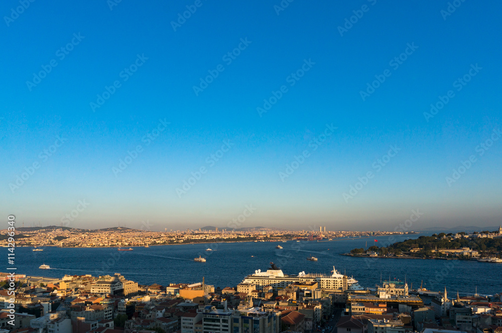 Aerial view of Istanbul, Turkey. Modern transcontinental megalopolis cityscape at golden hour
