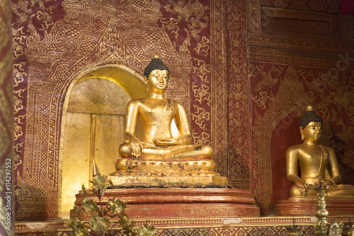 golden buddha statue in buddhism temple