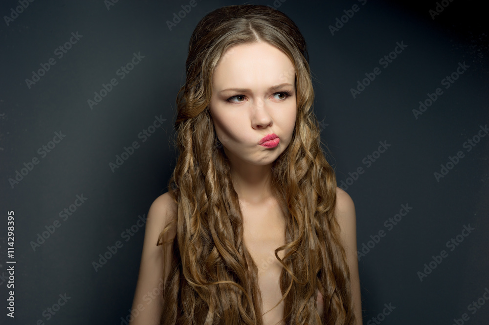 Portrait of a thinking beautiful young woman Portrait of a thinking beautiful young woman