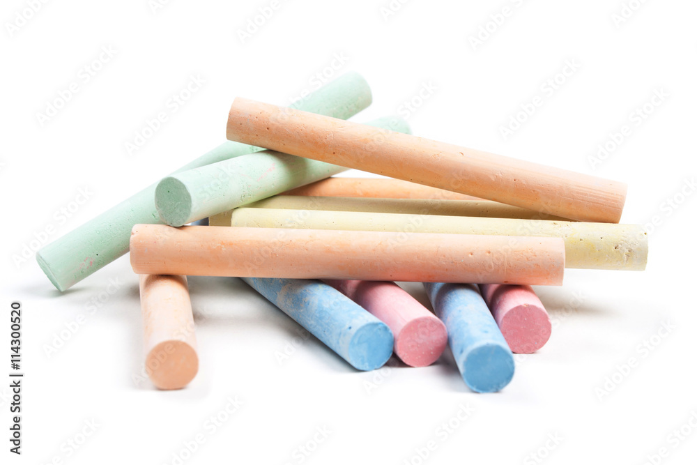 chalks in a variety of colors arranged on a white background