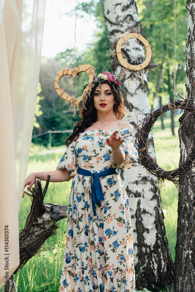 Beautiful Russian girl in the decoration on the nature Beautiful Russian girl in the decoration on the nature