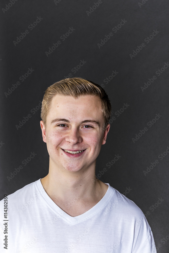 portrait of cute smiling teenage boy portrait of cute smiling teenage boy