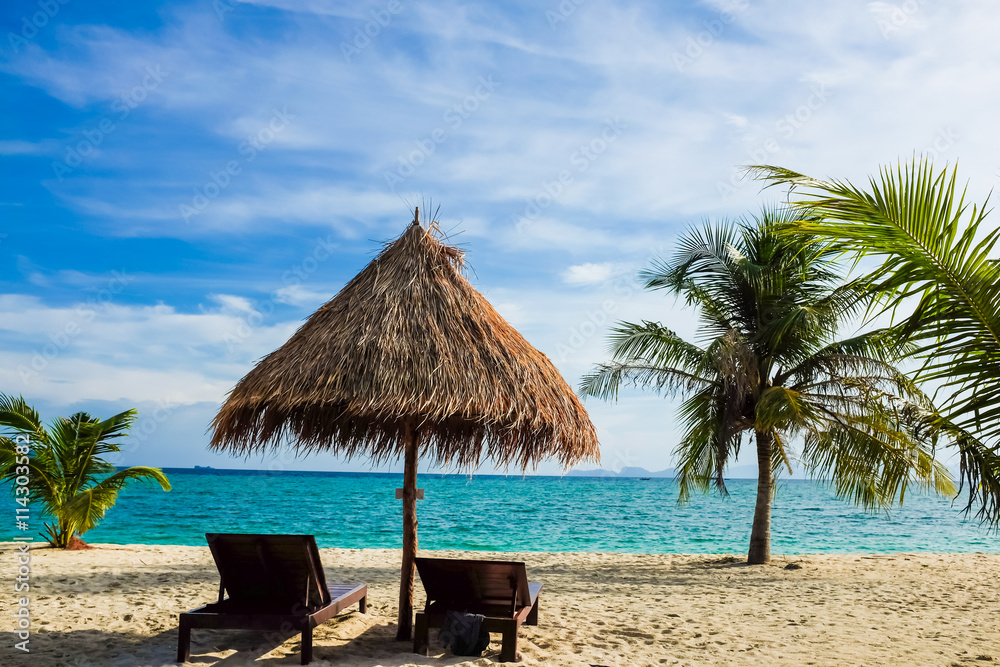 This is the vacation time show wood chairs on a beautiful tropic This is the vacation time show wood chairs on a beautiful tropic
