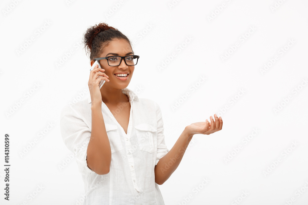 Portrait of young successful african business lady over white ba Portrait of young successful african business lady over white ba