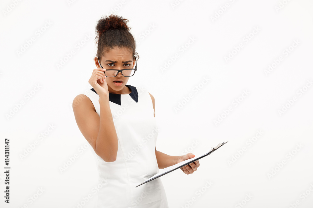 Portrait of young successful african business lady over white ba Portrait of young successful african business lady over white ba