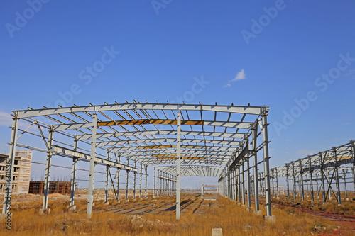 Wallpaper Mural In the construction site, steel structure is under construction Torontodigital.ca