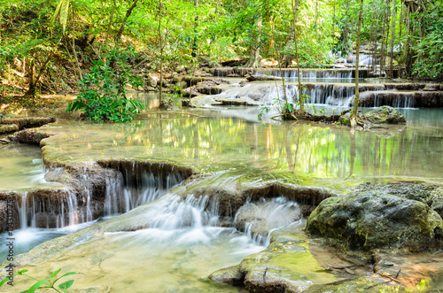 Beautiful waterfall and tropical forests at Erawan National Park is a famous tourist attraction in Kanchanaburi Province, Thailand