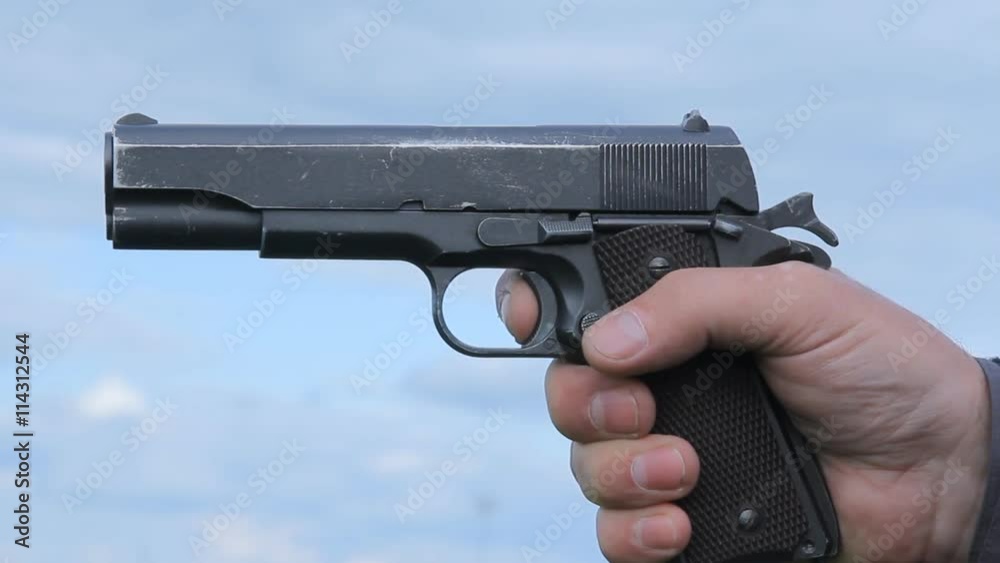 Hand Gun Shoot Revolver shooting and smoking, slow motion Hand Gun Shoot Revolver shooting and smoking, slow motion