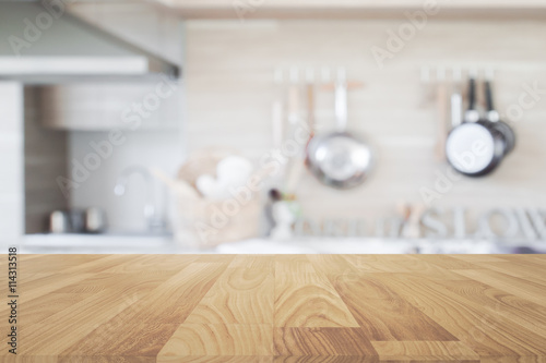 Wood table top with blur kitchen background , empty wooden table
