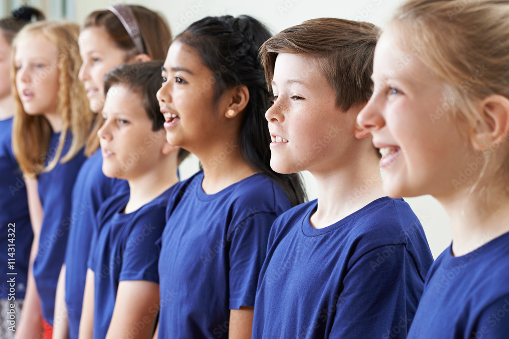 Group Of School Children Singing In Choir Together Group Of School Children Singing In Choir Together