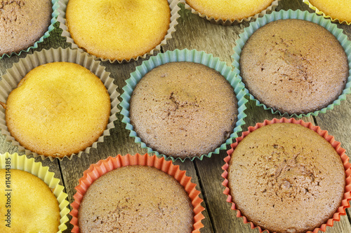 Homemade muffins in two colors on the table
