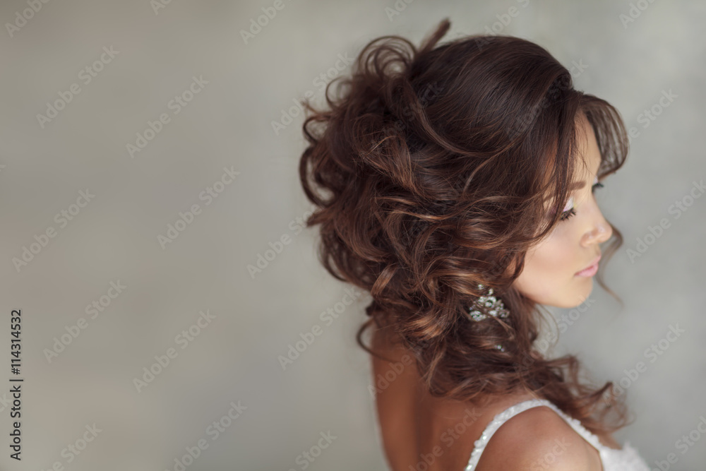 Portrait of beautiful bride with perfect makeup and hairstyle.