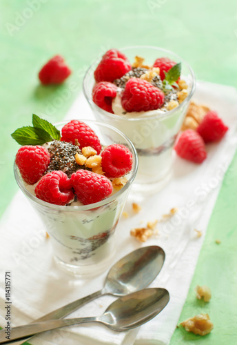 Yogurt with chia seeds, walnuts and raspberries