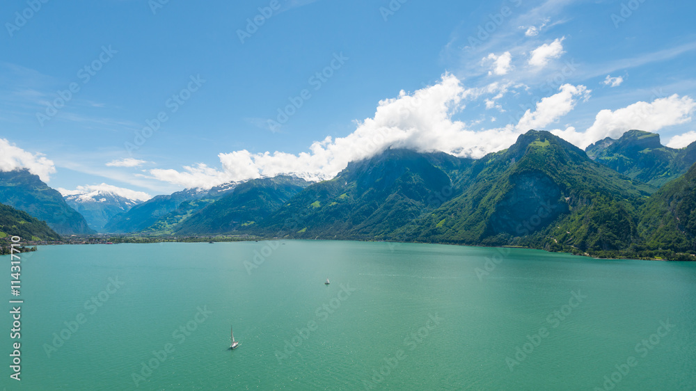 Canton Uri. Grandiose panorama of the mountains and lake. Summer day in  Alps. Europe.