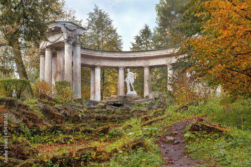 autumn morning, pavilion Apollo Colonnade with statue of Apollo Belvedere - roman marble copy of a bronze original of ancient Greek sculptor Leohara in Pavlovsk Park, Saint Petersburg, Russia